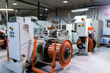Production of copper wire, bronze cable in reels at factoryの写真素材