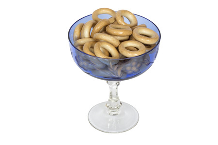 Glass bowl  with bagels. Isolation on a white background. Clipping path.の写真素材
