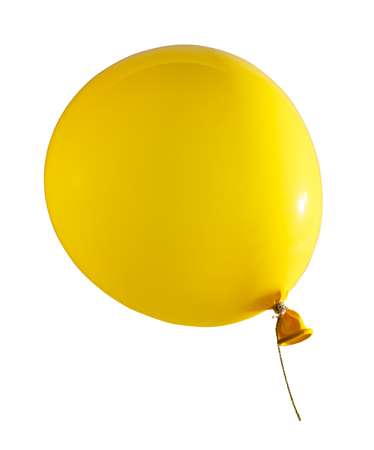 Yellow air flying ball isolated on white backgroundの写真素材
