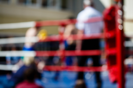 Boxing bout theme creative abstract blur background with bokeh effect. Not sharp picture as a background, wallpaper sport battle boxers in the ring
の写真素材