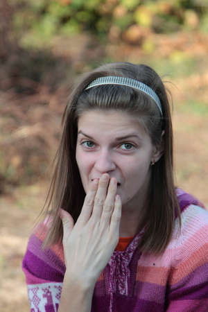 surprised girl with long hairの写真素材