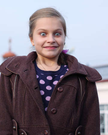very surprised  little girl with the big eyesの写真素材