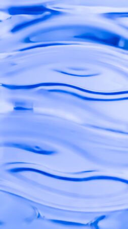 Abstract striped blue background with light and dark stripes and stains...の写真素材