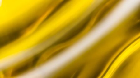 Orange and yellow background of abstract warm curves, hot wave, continuous lines with neon glow. template for card or banner. Colorful wavy wallpaperの写真素材