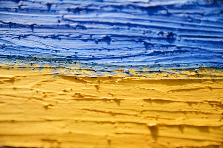Ukraine Flag. abstract yellow-blue background, selective focus.の写真素材