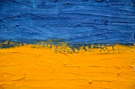 Ukraine Flag. abstract yellow-blue background, selective focus.の写真素材