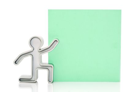 statuette with a green placard on a white backgroundの写真素材