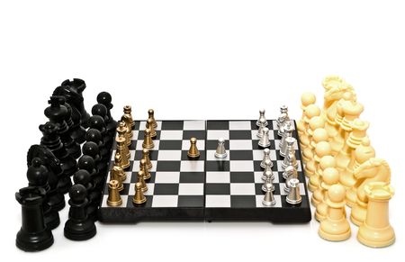 gold and silver chess on a white backgroundの写真素材