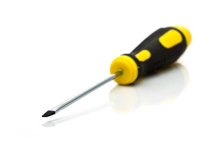 screwdriver with a yellow pen on a white background