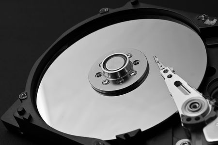 computer memory of disk on a black backgroundの写真素材