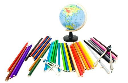 globe and pencils on a white backgroundの写真素材