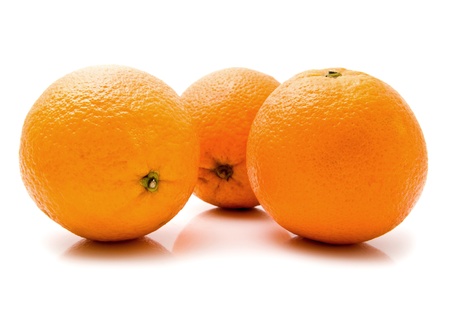 juicy oranges on a white backgroundの写真素材