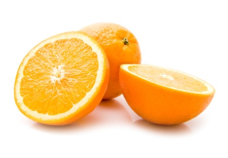 juicy oranges on a white background の写真素材
