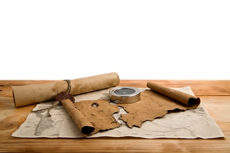 old paper and compass on a white backgroundの写真素材