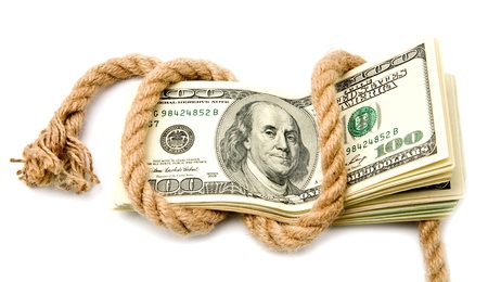 dollars and rope on a white backgroundの写真素材