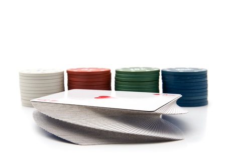 chips and maps for a poker on a white background の写真素材