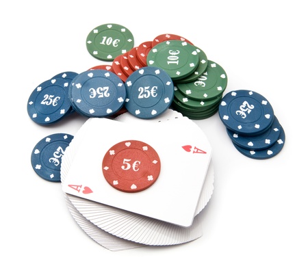chips and maps for a poker on a white backgroundの写真素材