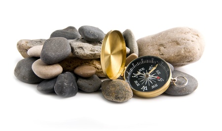 compass and stone on a white background 
の写真素材