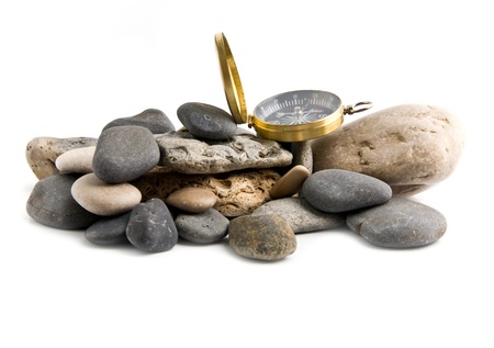 compass and stone on a white background 
の写真素材