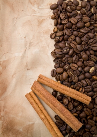 grains of coffee and cinnamon as a backgroundの写真素材