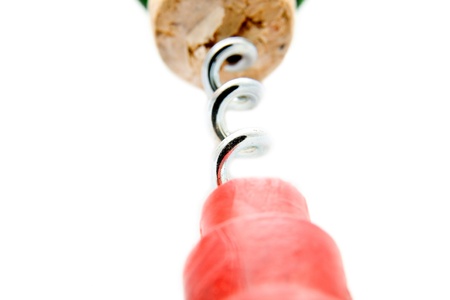 cork-screw and bottle on a white background の写真素材