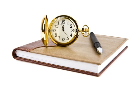pen, clock and notebook on a white background