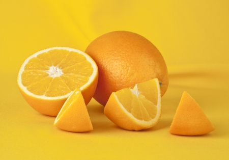 oranges on a yellow background