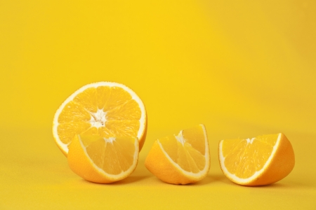 oranges on a yellow background