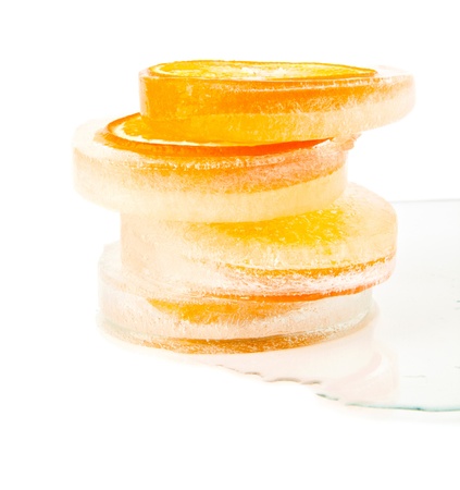 oranges in ice on a white backgroundの写真素材