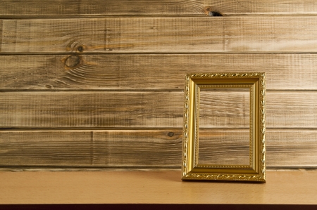 photo frame on the wooden tableの写真素材