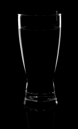 the glass of water on a black background の写真素材
