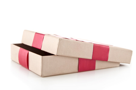 box with a red ribbon on a white background
