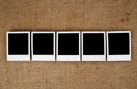 old pictures on a background a rough canvasの写真素材