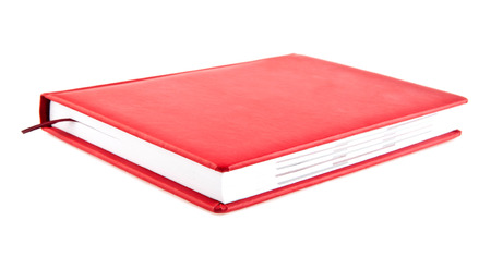 red book on a white backgroundの写真素材