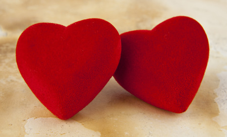 hearts on a background an old paperの写真素材