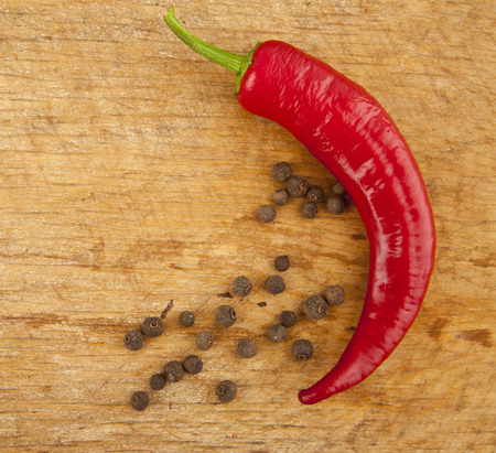 pepper on a wooden background