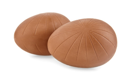 chocolate eggs on a white backgroundの写真素材