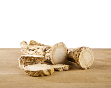horseradish with on wooden backgroundの写真素材