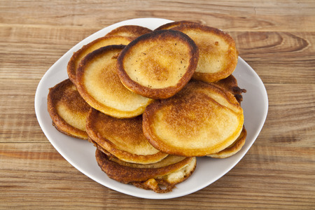 pancakes on wooden background