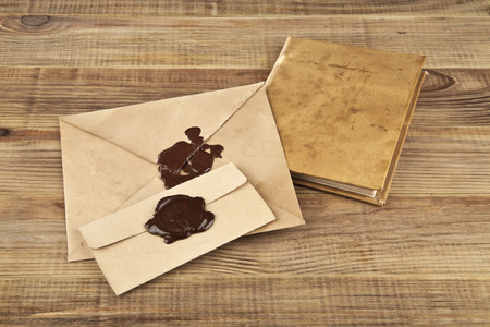 old paper on a wooden backgroundの写真素材