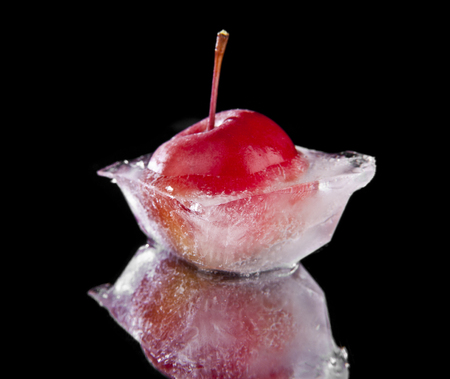 frozen apple on a black backgroundの写真素材