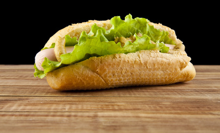 hot dog on a black backgroundの写真素材