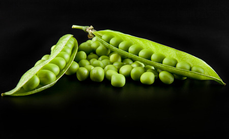 green peas on a black background closeupの写真素材