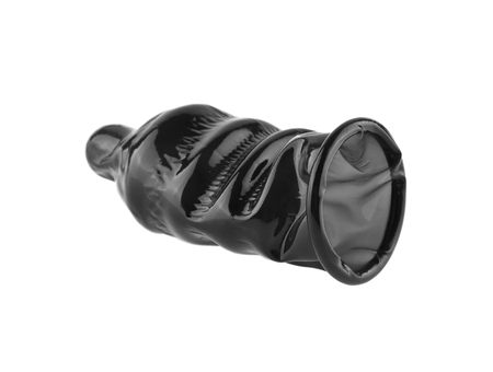 black condom isolated on white background closeupの写真素材