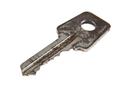 old key isolated on white background closeupの写真素材