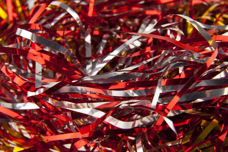 texture of red and golden shiny stripes as backgroundの写真素材