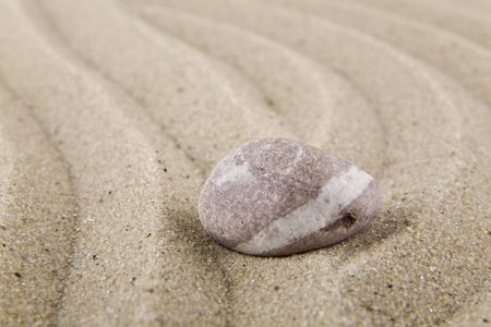 stones on sand for relaxation as backgroundの写真素材