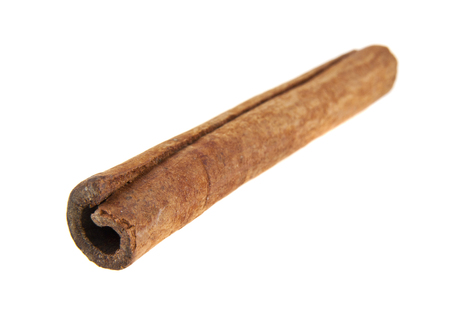 cinnamon sticks isolated on white backgroundの写真素材