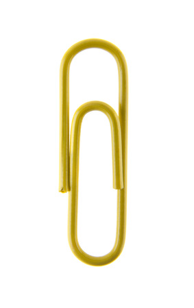 yellow paper clip isolated on white backgroundの写真素材