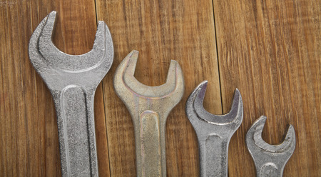 Spanners on a wooden backgroundの写真素材